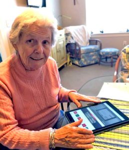 senior with tablet